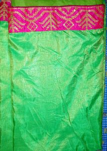 Parrot green saree with boat neck pink blouse