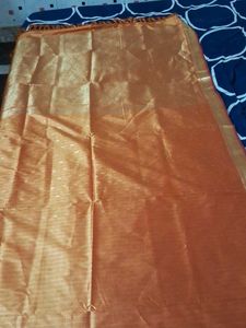 It Is Beautiful Mango Color Silk Saree.