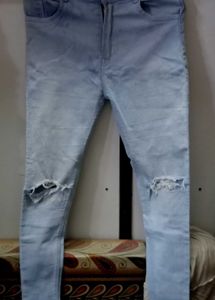 Ripped Knee Light Wash Jeans