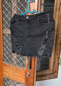 Ripped denim skirt