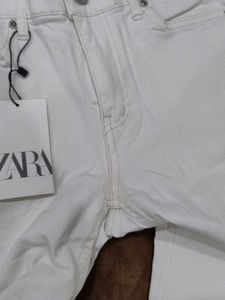 le CORMANG White Raw Hem Jeans