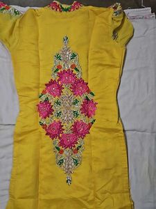Yellow Kurti With Pink Embroidery