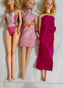 Lot of 11 Barbie Dolls