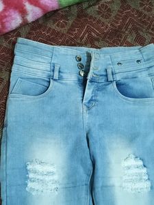 Ripped High-Waisted Jeans