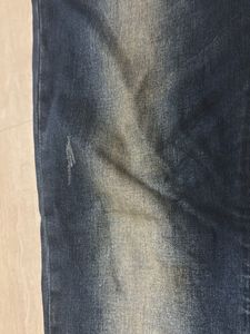 Distressed Denim Jeans