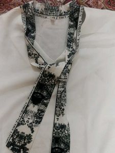White Top with Black Tie