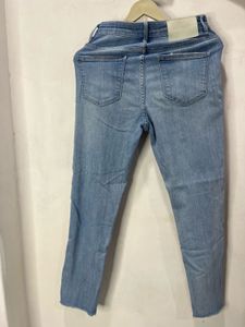 Ripped Hem Jeans