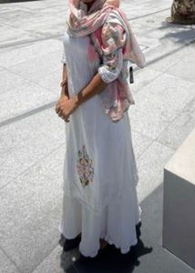 Elegant White Kurta And Skirt