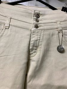 Tapered Fit Mid Rise Jeans