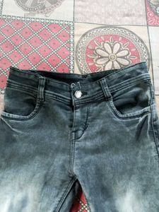 Ripped Knee Jeans