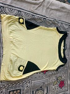Beautiful Seleveless Top In Yellow Black Colour