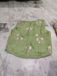 cream gown with mint green jacket