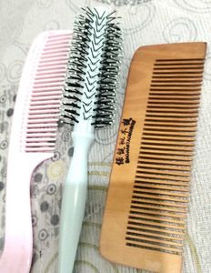 A Set Of 3 COMBS