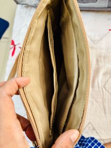 Tan Color Stitch And Hide Sling Bag