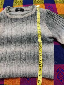 Stylish grey and white sweater