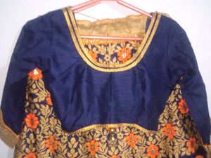 Lehenga With Stiched Blouse And Dupatta
