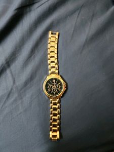 Rose Gold Round Dial Watch