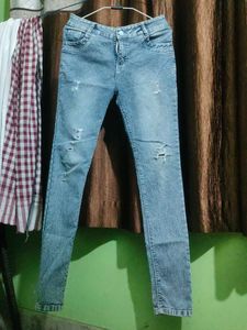 Ripped Blue Denim Jeans