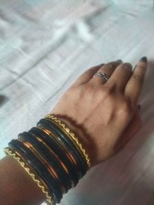 golden and black bangles
