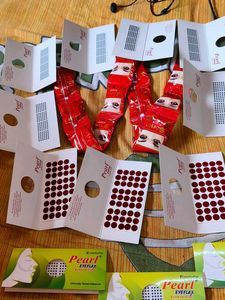 13 bindi sets and 12 kajal set