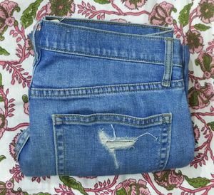 A ripped n patch jeans