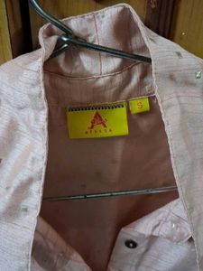 Sleeveless button up shirt