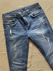 Distressed Slim Fit Jeans
