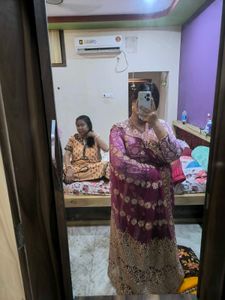 Heavy Work Purple Net Saree With Shiny Petticoat.