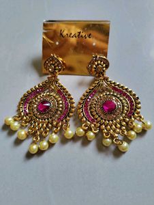 Statement earrings with pink stone and pearl