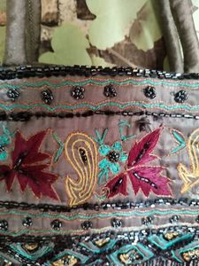 Embroidered Handbag with Moti Tassels