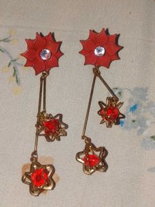 Set of 7 earrings and 1 necklace