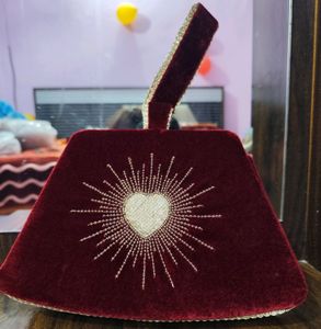 Charlotte Tillbury Potli.