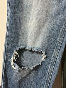 Ripped Knee Jeans