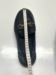 Black Loafers with Gold Detail