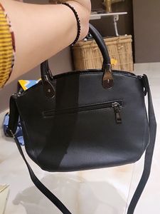 Sling Plus Handbag