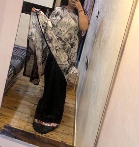 Elegant Black & White Floral Saree