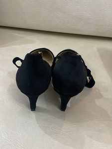 Black Heels with Silver Embellishments