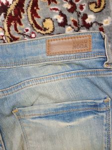 Distressed Denim Jeans