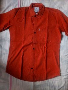 A Red Shirt Of Medium Size