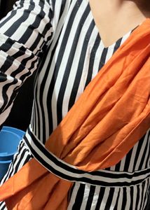Bold Striped Jumpsuit with Statement Orange Detail