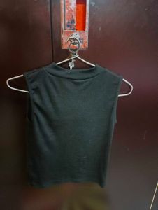 Black Sleeveless Turtleneck Top