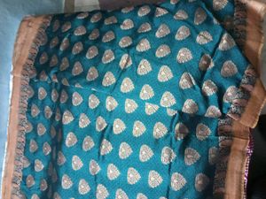 Embellished Banarasi Saree With Patterned Blouse.