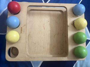 Combo Of Books And Peg Toy