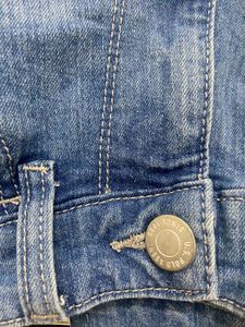 Light blue denim jeans with a cool distressed look