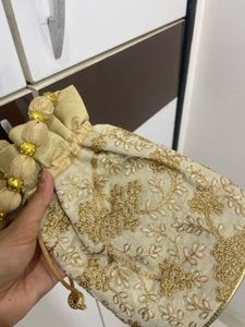 Elegant Gold Embroidered Potli Bag