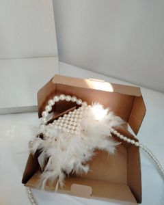 Pearl &amp; Feather Clutch