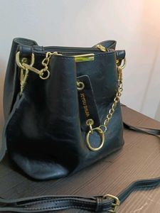 Black Bucket Bag with Gold Accents