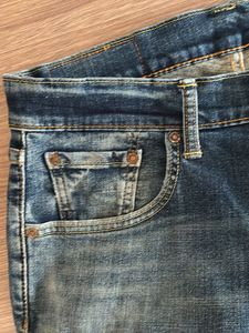 Distressed Denim Jeans