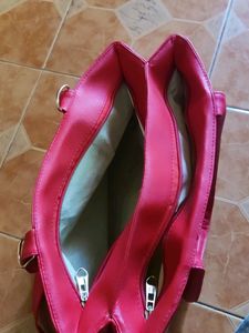 A Beautiful Tomoto Red Hand Bag