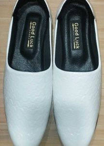 White Nagra slip-on shoes